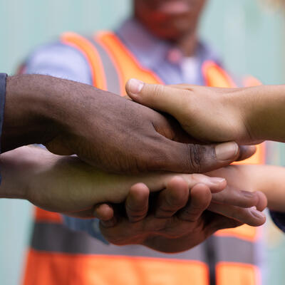 People stack their hands