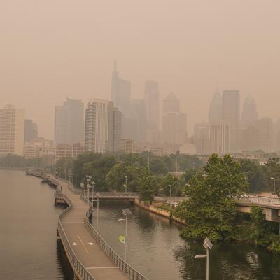 Wildfire smoke clouds out the New York City skyline