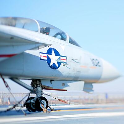 A fighter jet taxis to the runway